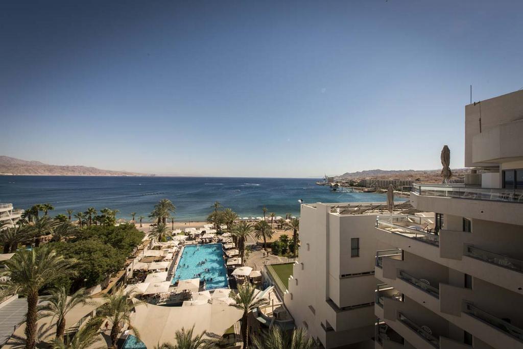 Neptune Eilat By Dan Hotels Exterior foto View of the Red Sea from the Hilton Taba